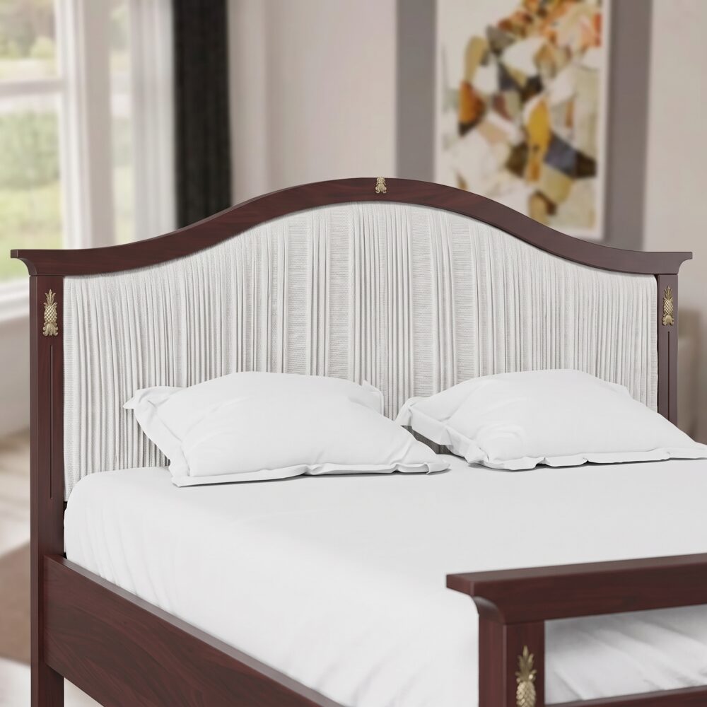 Classic walnut solid wood upholstered platform bed with an elegant arched fabric headboard and decorative brass accents in a sophisticated bedroom.