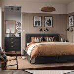 Modern black wooden platform bed with a panel headboard and built-in pull-out storage drawers in a contemporary bedroom.