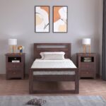 Modern walnut wooden platform bed with minimalist open headboard and sturdy frame in a contemporary bedroom.