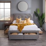 Modern gray upholstered platform bed with padded headboard and four pull-out storage drawers in a contemporary bedroom.