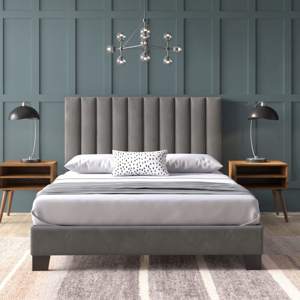 Modern grey upholstered platform bed with a vertical channel tufted headboard, contemporary fabric bed frame, and minimalist bedroom furniture.