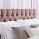 Luxury blush pink velvet upholstered platform bed with diamond button tufted headboard, modern bedroom furniture, and elegant contemporary design.