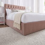 Luxury blush pink velvet upholstered platform bed with diamond button tufted headboard, modern bedroom furniture, and elegant contemporary design.