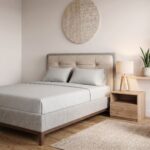Modern beige upholstered platform bed frame with button-tufted headboard, walnut wood legs, and contemporary minimalist bedroom décor.