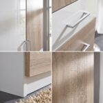 Modern white and oak wardrobe featuring two doors, hanging rail, storage shelves, cubbies, and three spacious drawers for bedroom organization.