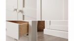 Modern white 2-door wardrobe with four drawers, hanging rail, adjustable shelves, and spacious bedroom storage for clothes, linens, and accessories.