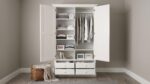 Modern white 2-door wardrobe with four drawers, hanging rail, adjustable shelves, and spacious bedroom storage for clothes, linens, and accessories.