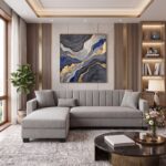 Modern light gray L-shaped sectional sofa with chaise lounge, premium fabric upholstery, vertical channel backrest, and contemporary design.