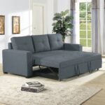 Modern dark grey fabric sofa cum bed with pull-out sleeper mechanism displayed in a contemporary living room, converted into a spacious bed for guests.