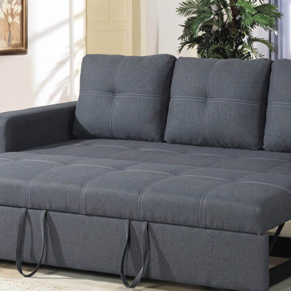 Modern dark grey fabric sofa cum bed with pull-out sleeper mechanism displayed in a contemporary living room, converted into a spacious bed for guests.