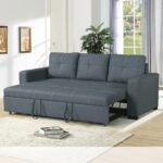 Modern dark grey fabric sofa cum bed with pull-out sleeper mechanism displayed in a contemporary living room, converted into a spacious bed for guests.