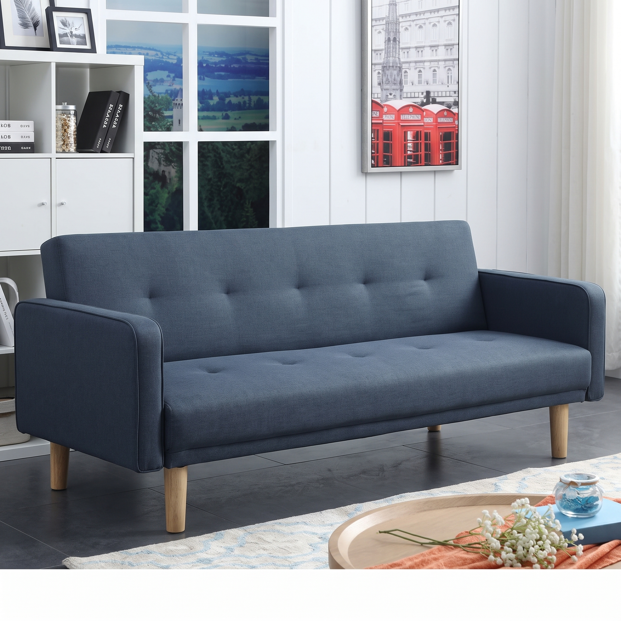 Modern Navy Blue Fabric Sofa Cum Bed – Convertible 3-Seater Sleeper Sofa Modern navy blue fabric sofa cum bed with button-tufted backrest, wooden legs, and fold-flat convertible design in a contemporary living room.