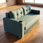 Modern teal fabric sofa cum bed with tufted back cushions, integrated armrest cup holders, wooden base, and convertible sleeper design in a contemporary loft-style living room.