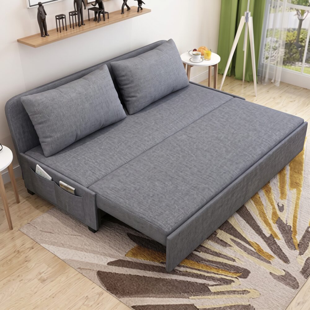 Modern grey fabric sofa cum bed converted into a spacious sleeper bed with dual side storage pockets, premium upholstery, high-density foam cushions, and contemporary design for living room or guest room.