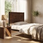 Rustic wood and matte black metal single bed frame styled with neutral beige bedding and waffle throw blanket.