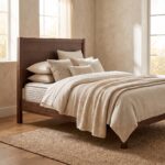 Solid walnut wood single bed frame featuring a tall wooden headboard styled with neutral linen pillows and bedding next to a matching bedside table.